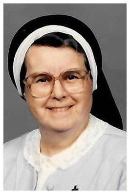 A smiling nun